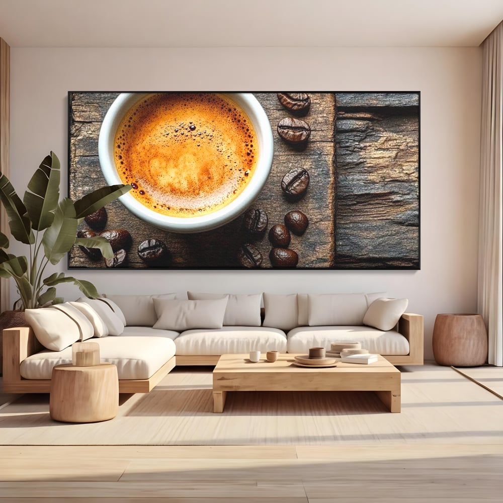 Tablou canvas cu ceasca de espresso si boabe de cafea, in rama de aluminiu negru, pe perete intr-un living
